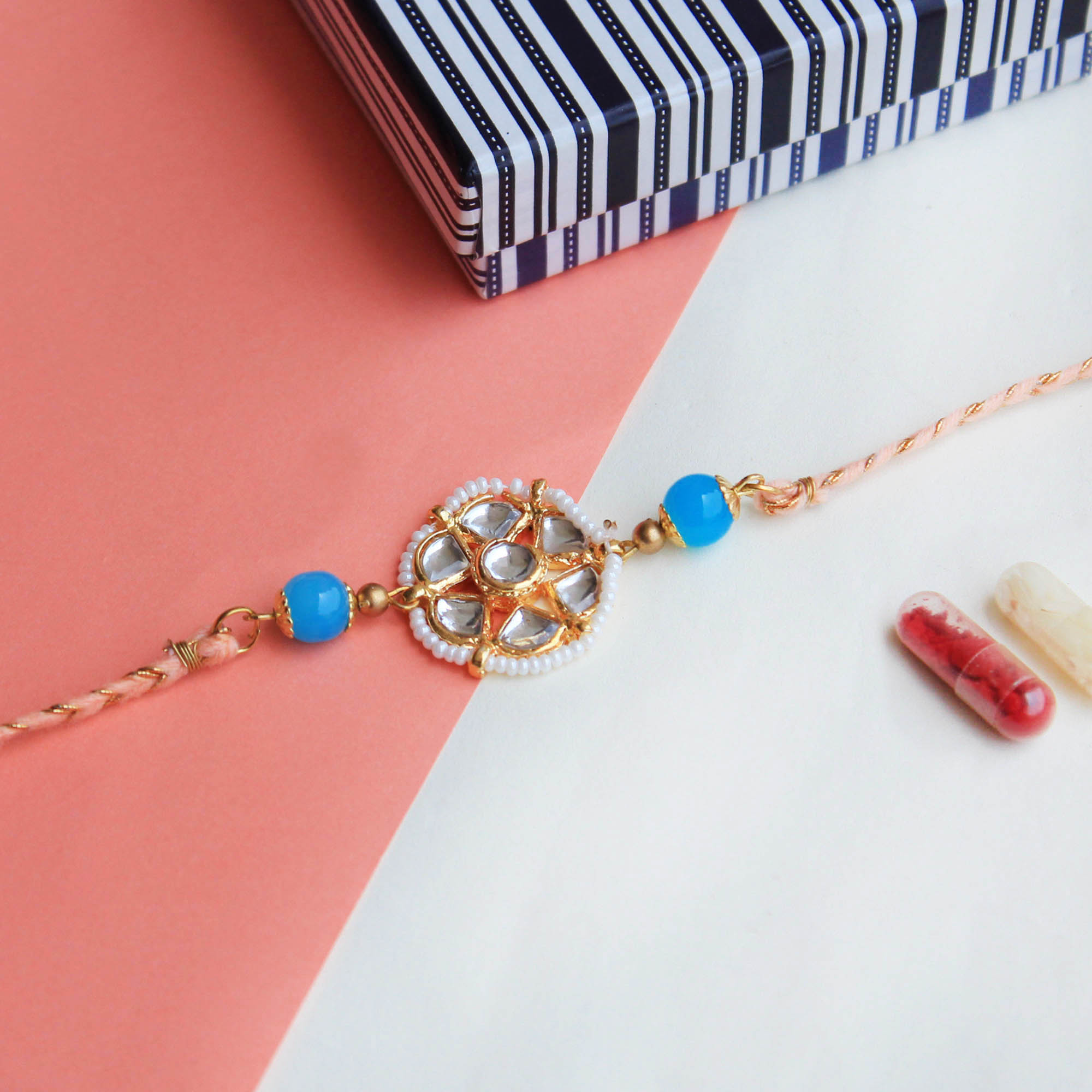 Floral Kundan rakhi with Roli Chawal